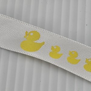 Nastro bianco con anatroccoli